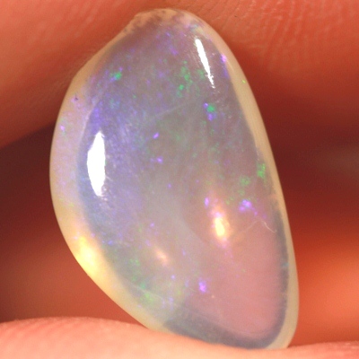 SOLID CRYSTAL OPAL Green sparkle over a purple hue